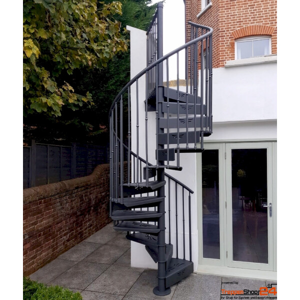 Ansicht Spindeltreppe Antik Zink Ø 110 cm, 12 Steigungen (11 Stufen + Podest) Stahlblechstufen, Geländer mit Stahlhandlauf Ø 42,4 mm, Pfosten Ø 30 mm und senkrechte Geländerstäbe Ø 16 mm mit Zierelement. Alle Metallteile pulverbeschichtet.
